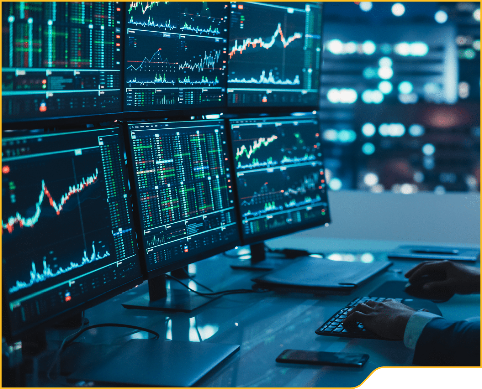 Financial Analyst Working on Computer with Multi-Monitor Workstation with Real-Time Stocks, Commodities and Exchange Market Charts  African American Trader Works in Investment Bank Late at Night 