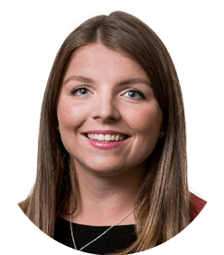 A woman wearing a red jacket and a black shirt. Description generated by AI