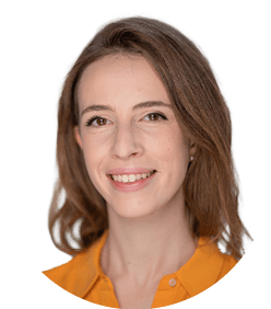 A woman wearing an orange shirt. Description generated by AI