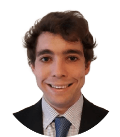 A man wearing a suit and tie. Description generated by AI